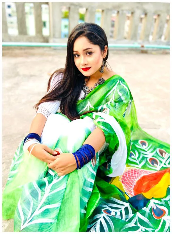 Mitanur Rahman Mimi in green sari